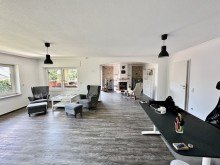 Wohnzimmer Sanierter Bungalow mit Einliegerwohnung in beliebter Wohnlage