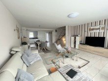 Wohnzimmer Energiesparen in moderner Doppelhaush�lfte